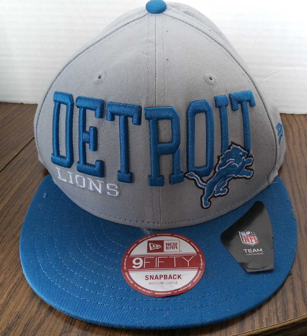 New Era Detroit Lions Size Medium-Large Silver And Blue Snapback Hat